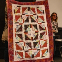 Kim W. Stripology quilt she pieced and quilted